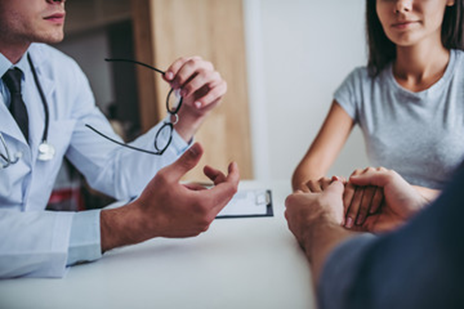 Couple getting a thyroid condition diagnosis from AFC Urgent Care Malden