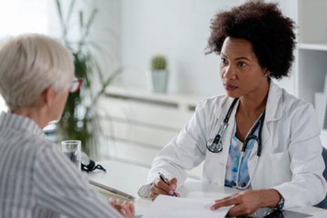 Elderly woman getting evaluated for a thyroid disorder at AFC Urgent Care Southington