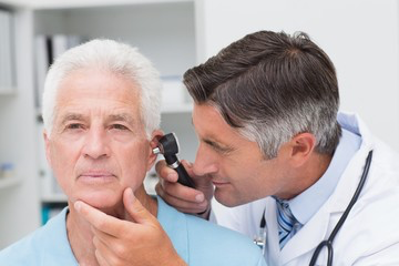 Older man complaining of swimmer’s ear, so he went to get his ear checked by a provider at AFC Urgent Care Springfield to confirm it’s swimmer’s ear