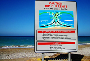 Summer is prime time for beach action, and for good reason! The surf and the sand are so much easier to enjoy when it’s warm enough to play in them. But there are some risks you might not know about lurking in the depths. As we reach the end of Rip Current Awareness Week on