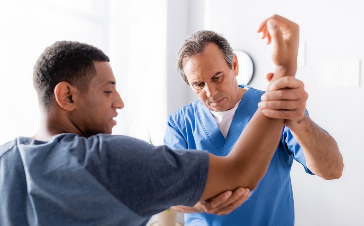 Medical provider treating nurse maid elbow on toddler