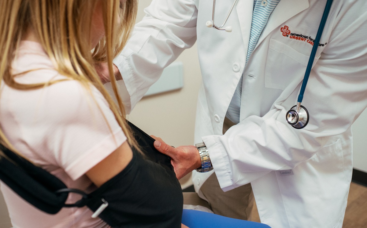 Medical provider treating nurse maid elbow on toddler