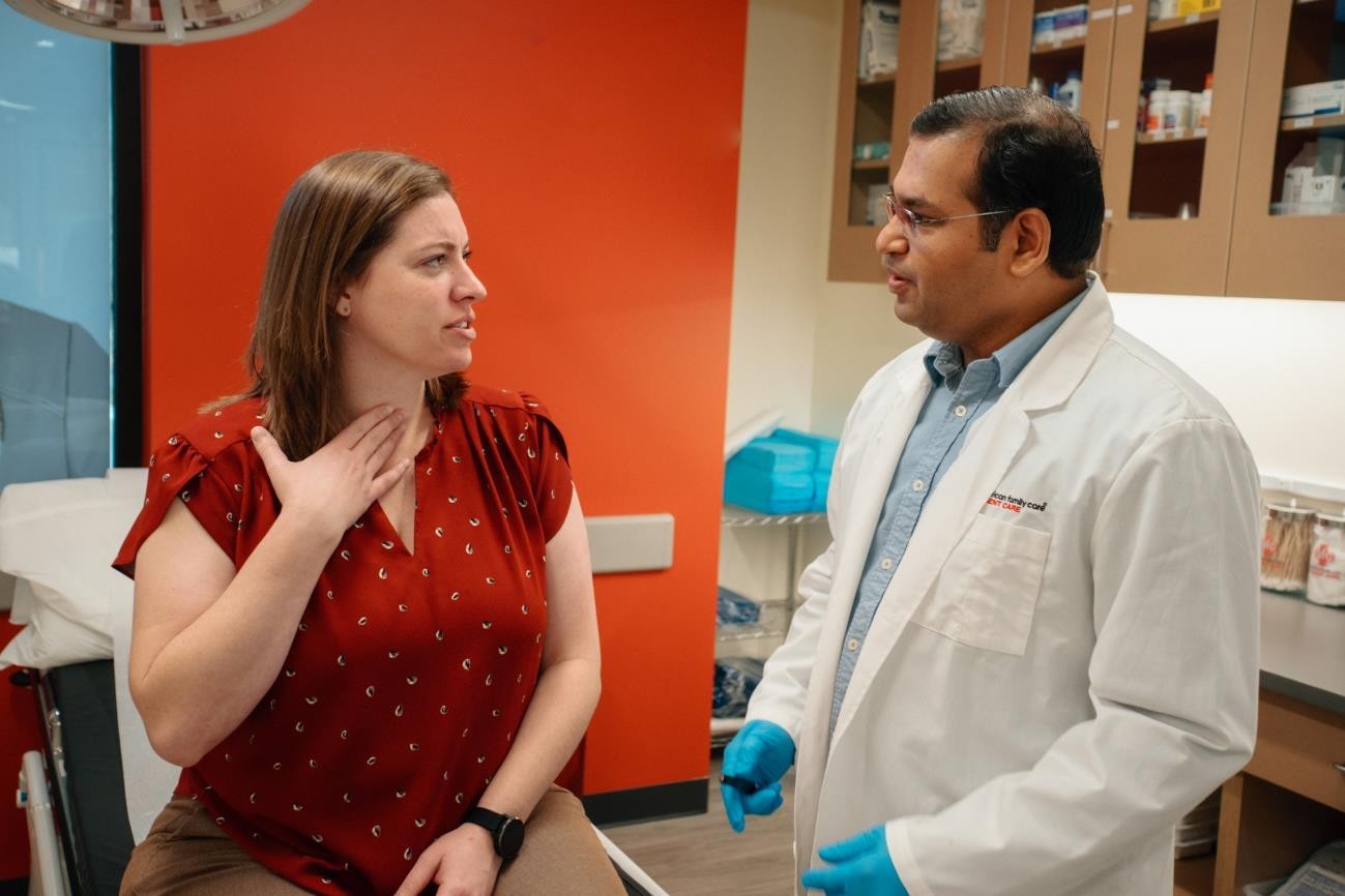 Female Patient Speaking with AFC Provider About Flu Symptoms