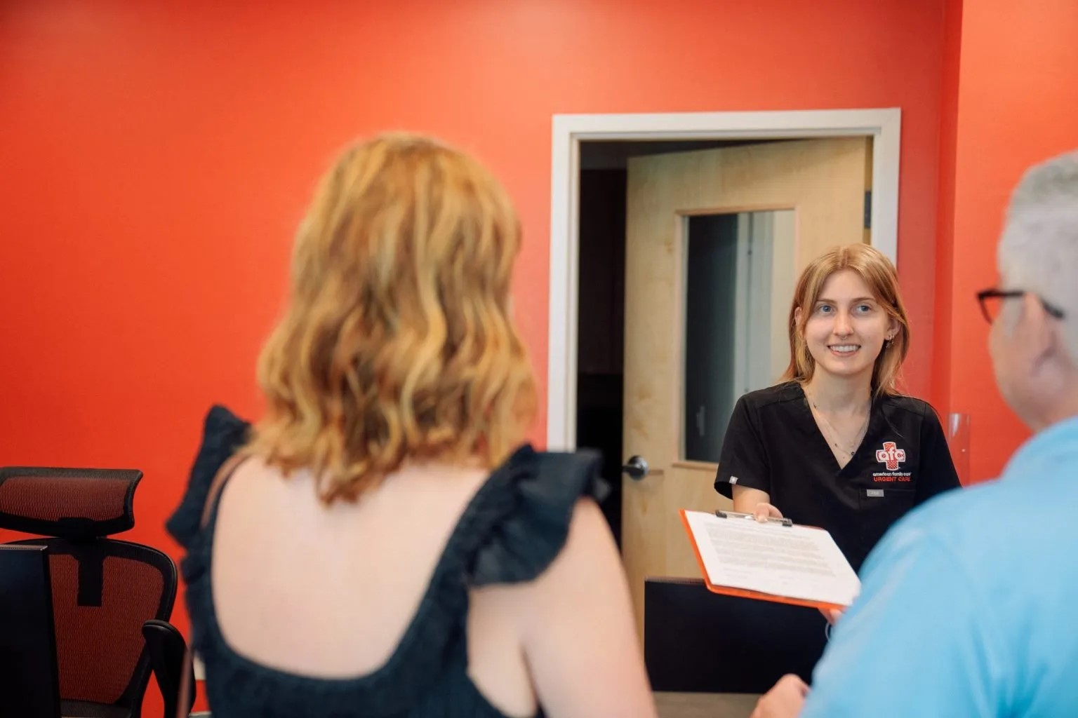 Patient checking in for urgent care services at AFC Fort CollinsPatient checking in for urgent care services at AFC Fort Collins