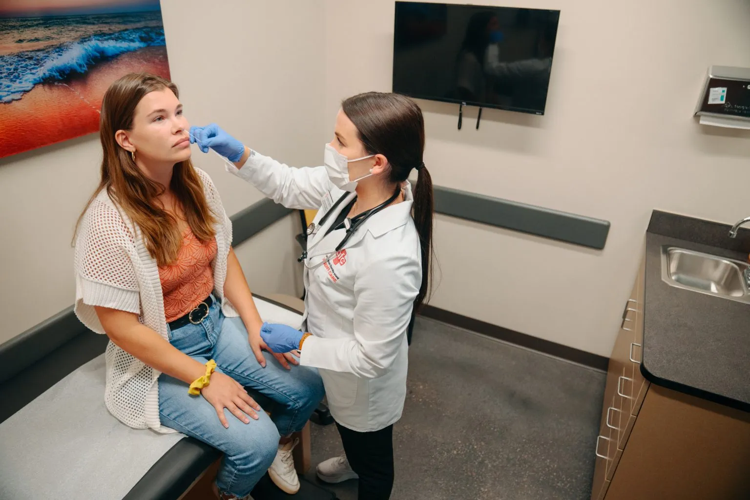 Female Patient Getting Tested For RSV at AFC