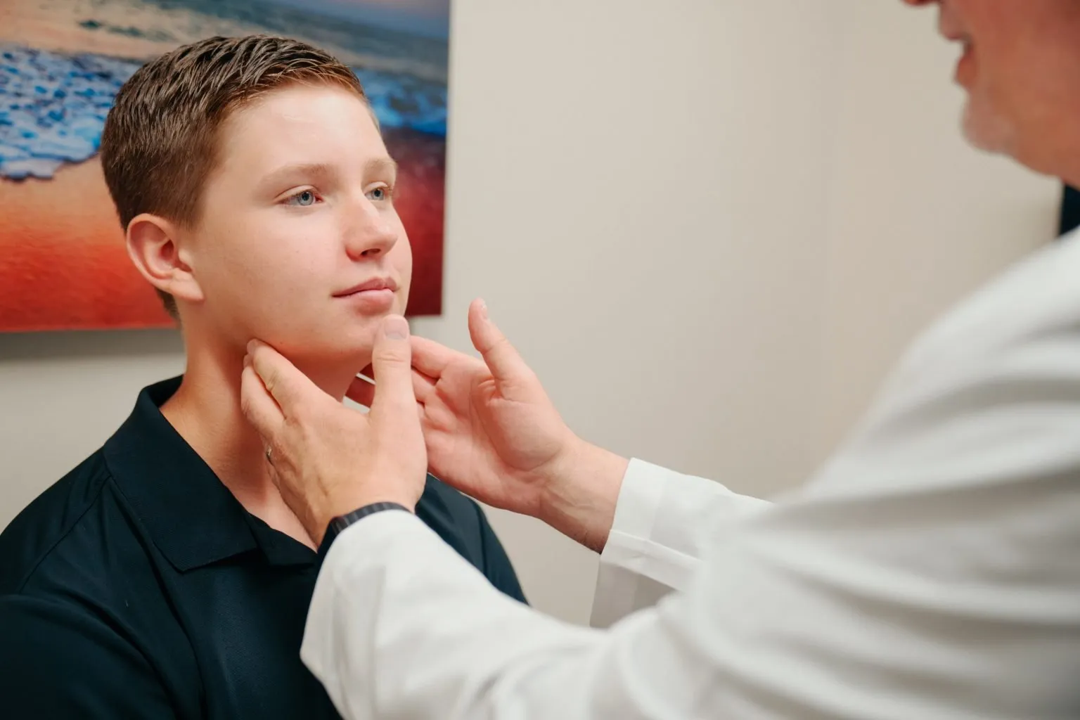 Teenage Boy Getting Strep Test at AFC