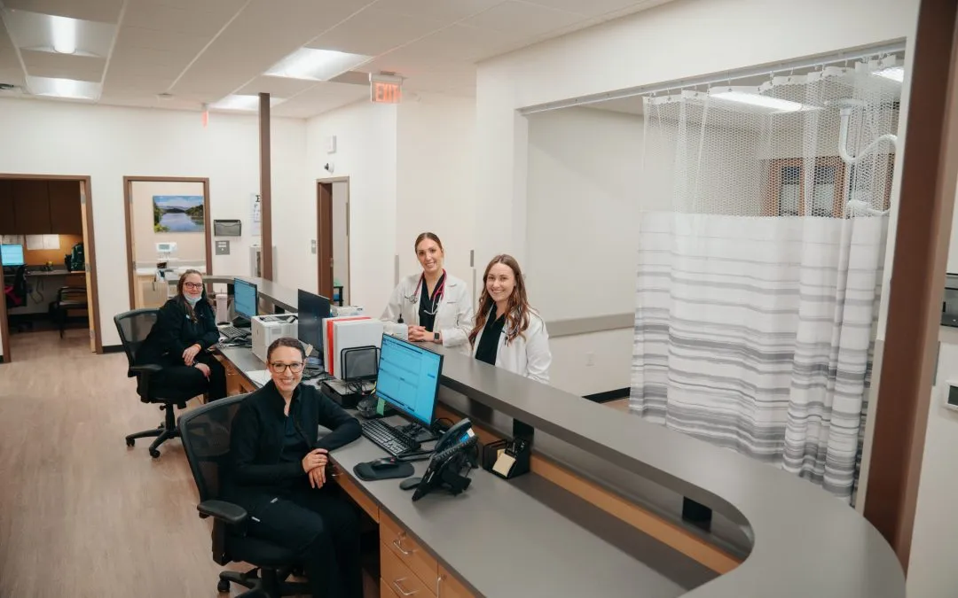 Smiling AFC Urgent Care employees at AFC Huntersville