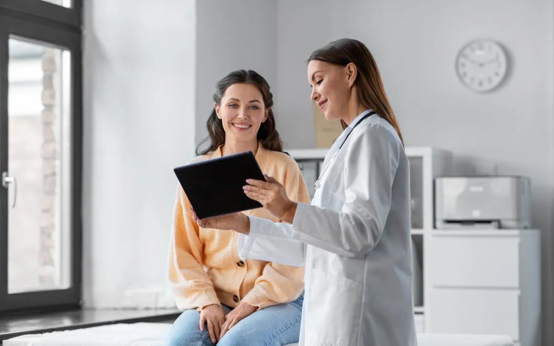 Female provider shows patient something on a tablet